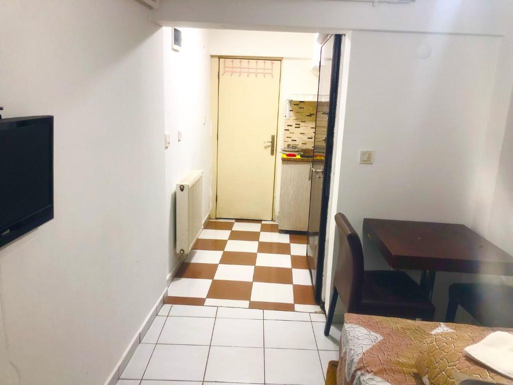 TV a/nebo společenská místnost v ubytování Taksim White Mansion Hotel