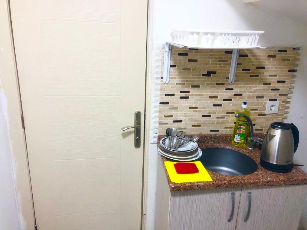 Kuchyň nebo kuchyňský kout v ubytování Taksim White Mansion Hotel