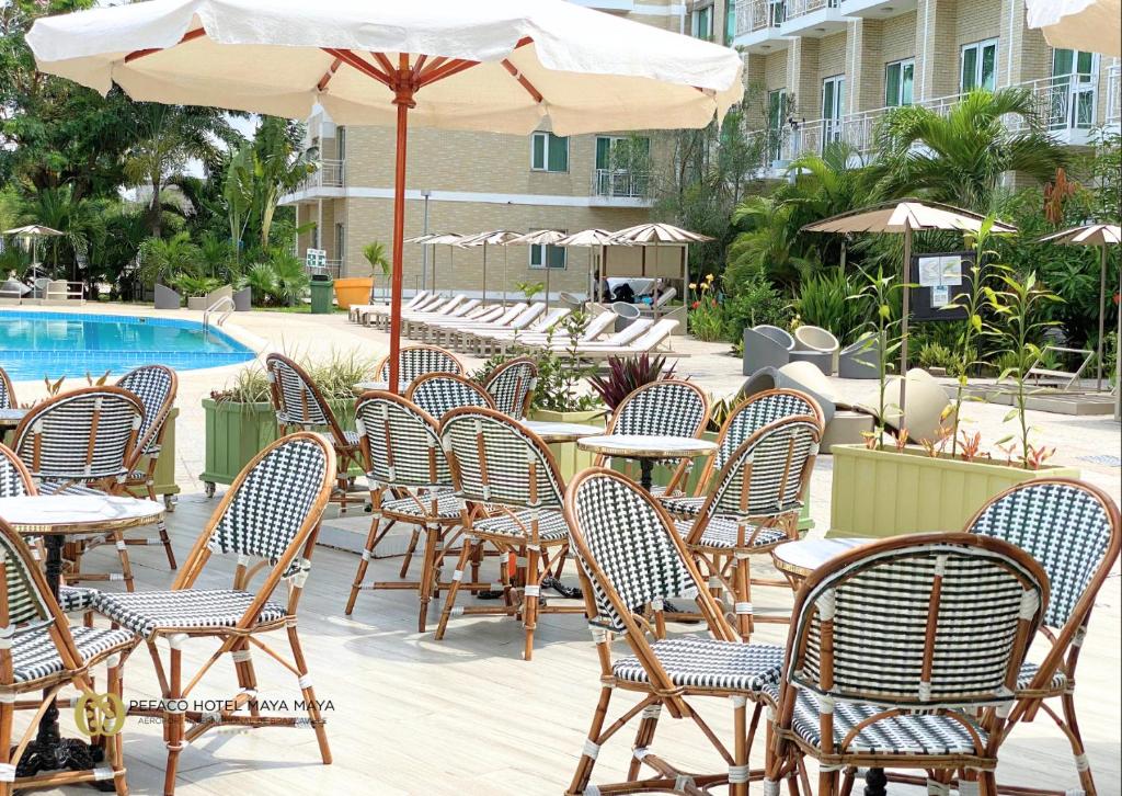 Bazén v ubytování Pefaco Hotel Maya Maya nebo v jeho okolí