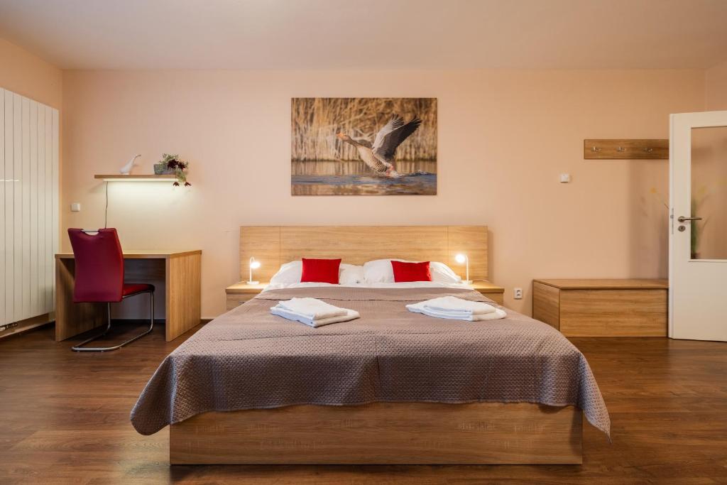 Postel nebo postele na pokoji v ubytování Apartmány Viva Třeboň
