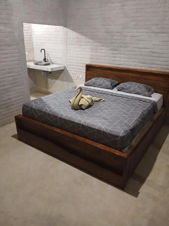Postel nebo postele na pokoji v ubytování Opik Homestay Tete Batu