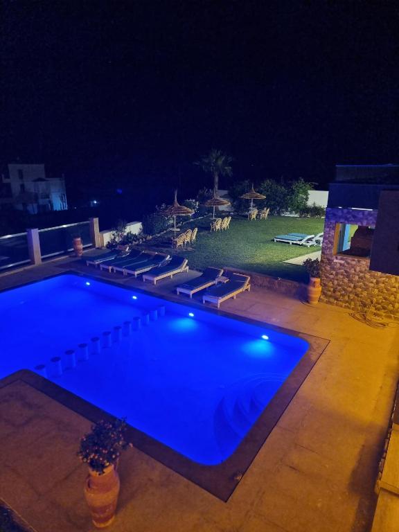 Bazén v ubytování Villa Le Pacha Assilah nebo v jeho okolí