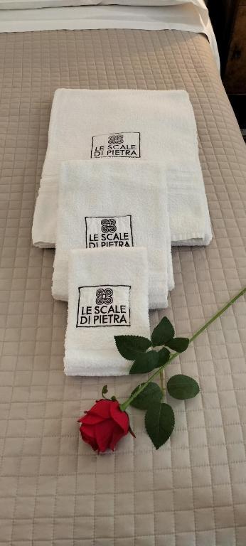 Postel nebo postele na pokoji v ubytování Le Scale di Pietra