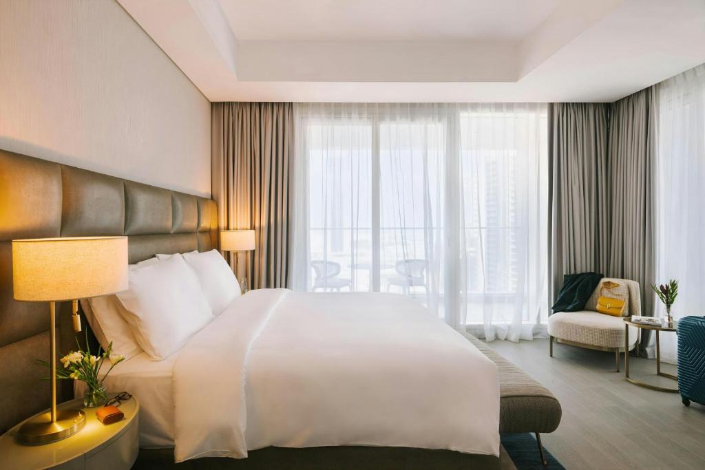 Postel nebo postele na pokoji v ubytování Sonder by Marriott Bonvoy Business Bay Apartments