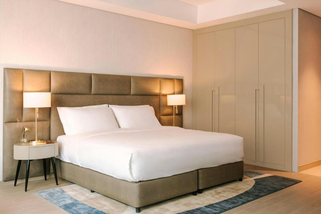 Postel nebo postele na pokoji v ubytování Sonder by Marriott Bonvoy Business Bay Apartments