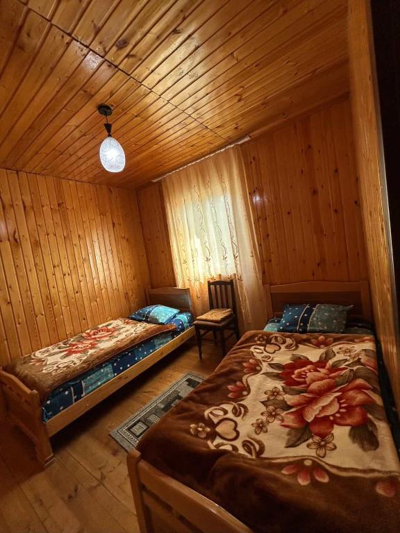 Postel nebo postele na pokoji v ubytování Bata GuesThouse