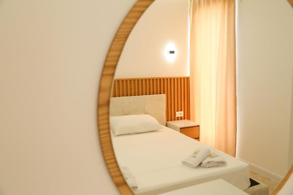 Postel nebo postele na pokoji v ubytování Primus Hotel