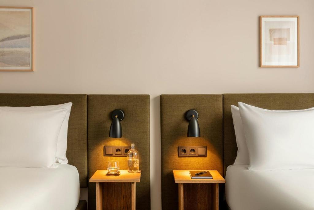 Postel nebo postele na pokoji v ubytování Middelland Hotel, Sonder by Marriott Bonvoy