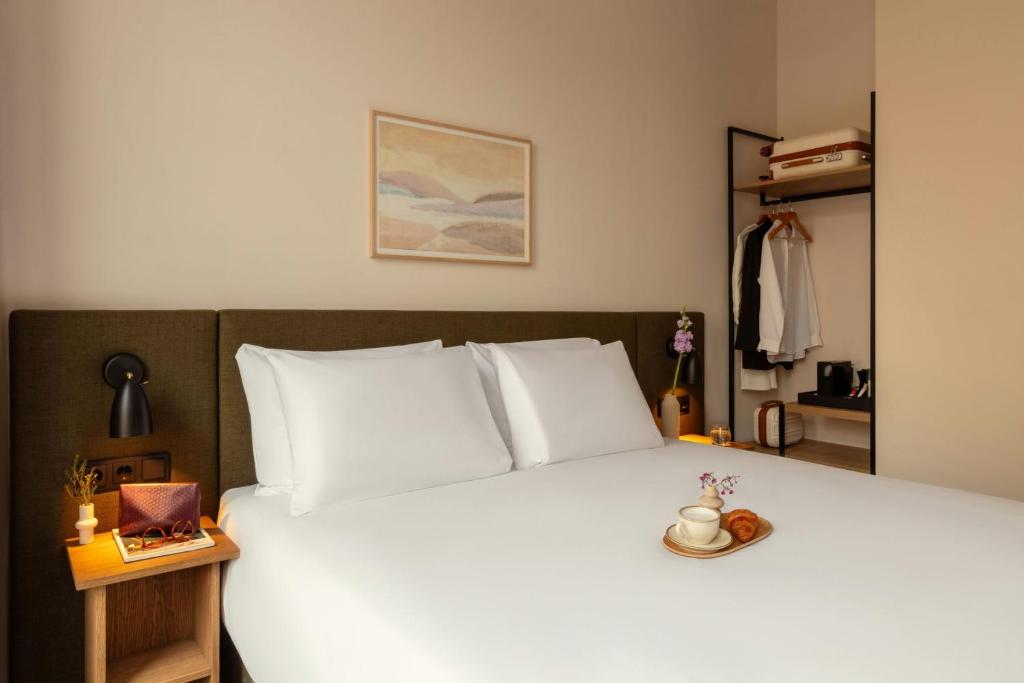 Postel nebo postele na pokoji v ubytování Middelland Hotel, Sonder by Marriott Bonvoy