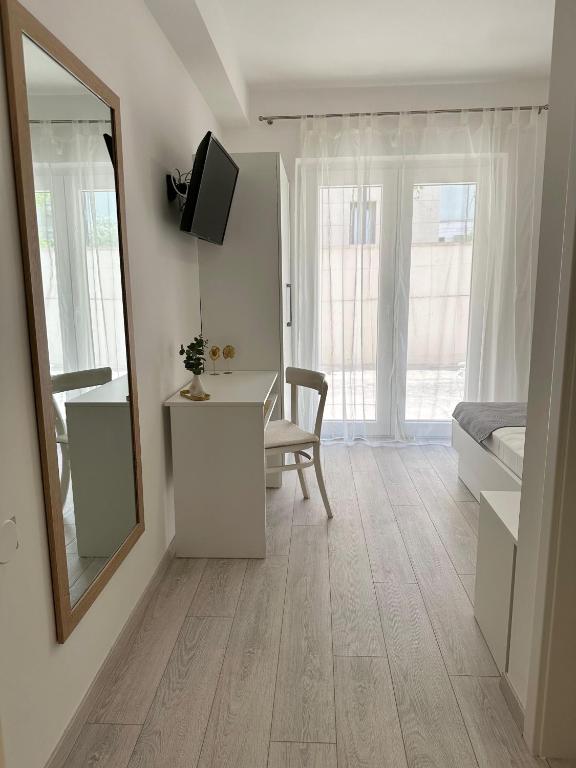 TV a/nebo společenská místnost v ubytování Apartments Olga 2