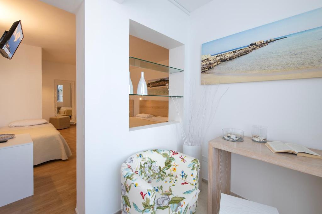 Postel nebo postele na pokoji v ubytování Hotel Albània