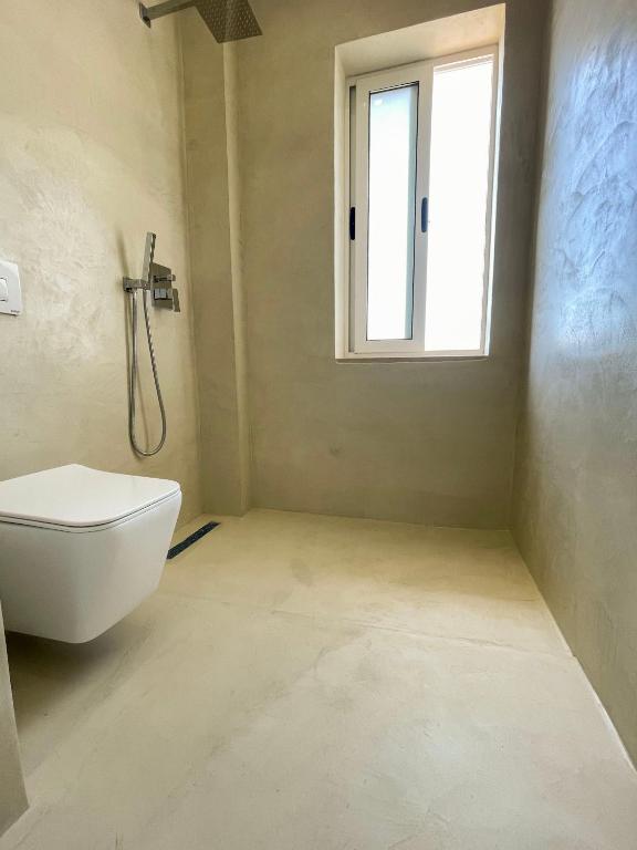 Koupelna v ubytování Primus Hotel