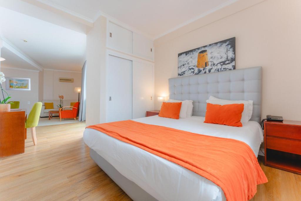 Postel nebo postele na pokoji v ubytování Duas Torres Hotel