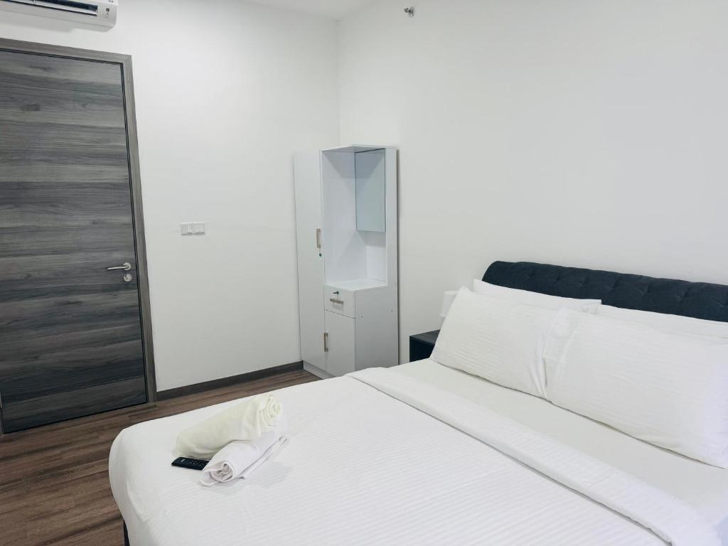 Postel nebo postele na pokoji v ubytování My Residence Agile TRX KL