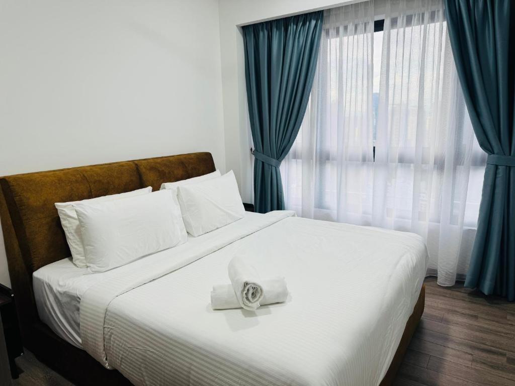 Postel nebo postele na pokoji v ubytování My Residence Agile TRX KL