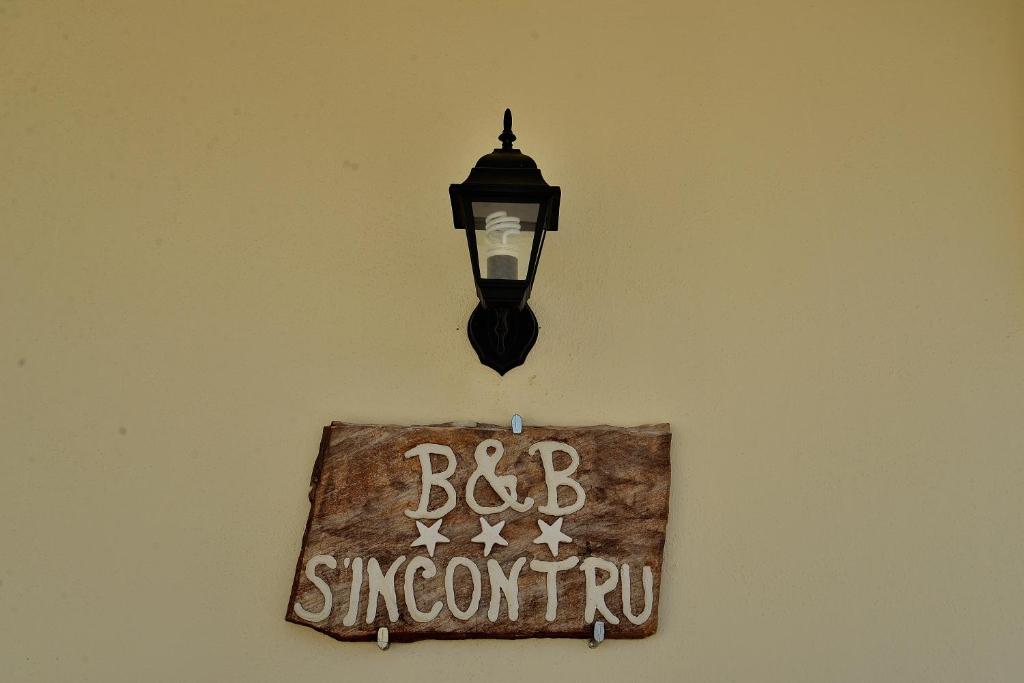 Certifikát, hodnocení, plakát nebo jiný dokument vystavený v ubytování B&B S'Incontru