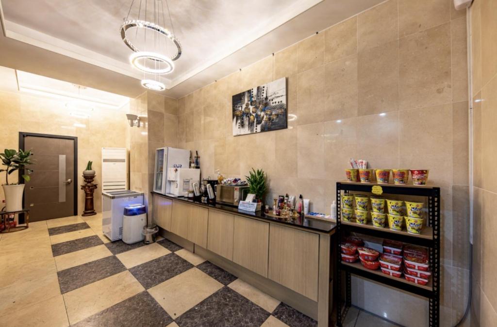 Kuchyň nebo kuchyňský kout v ubytování Sangmu Nemo Hotel
