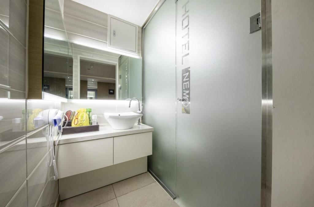 Koupelna v ubytování Sangmu Nemo Hotel
