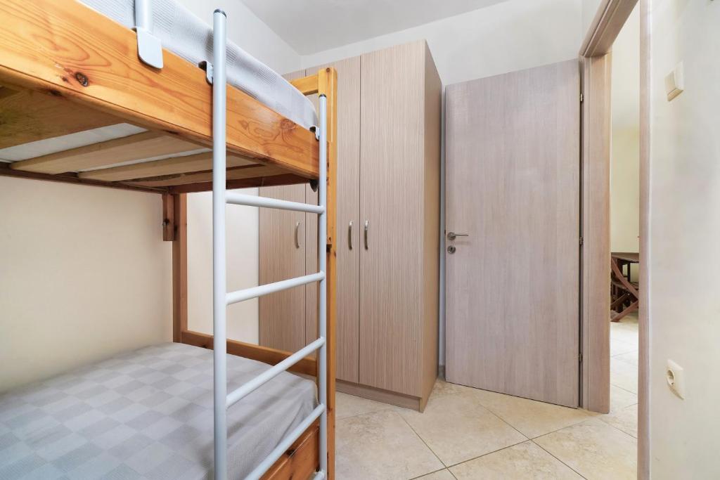 Postel nebo postele na pokoji v ubytování Studios Aspa II
