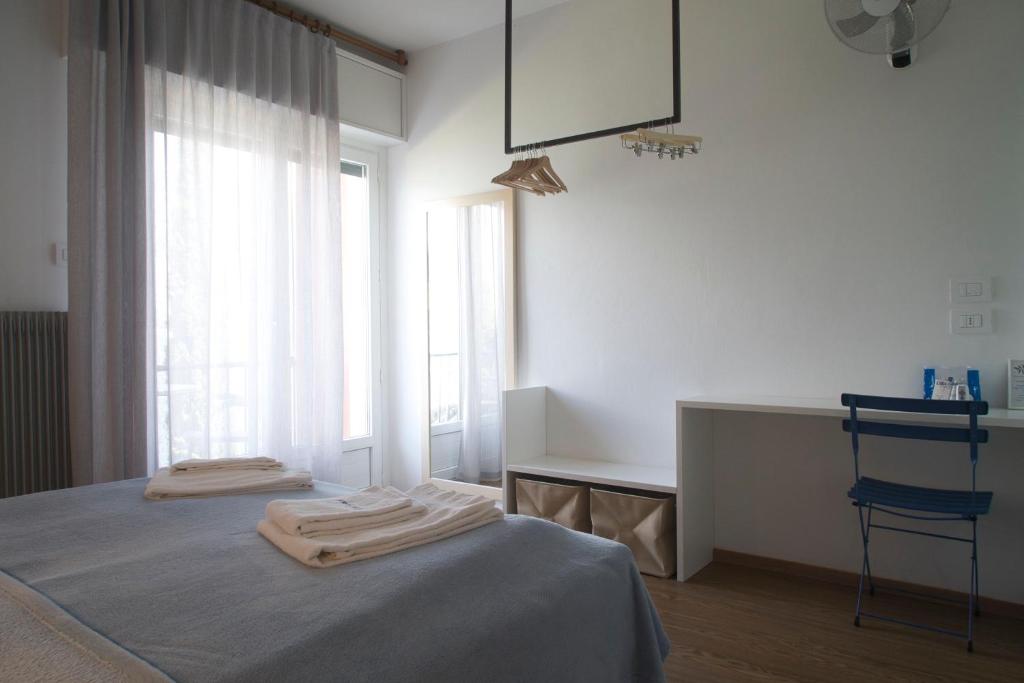 Postel nebo postele na pokoji v ubytování Villa Andreis