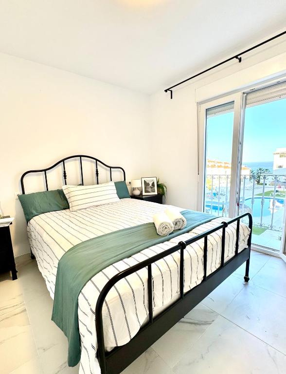 Posteľ alebo postele v izbe v ubytovaní Apartamento El Primer Sol