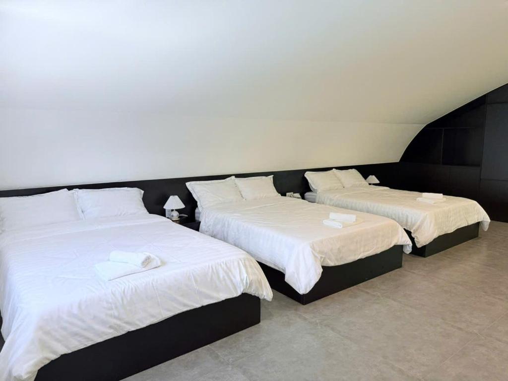 Postel nebo postele na pokoji v ubytování Villa 3B MAISON Signature