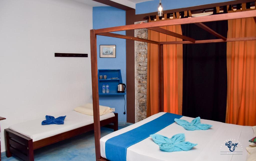 Postel nebo postele na pokoji v ubytování The Change Hotel