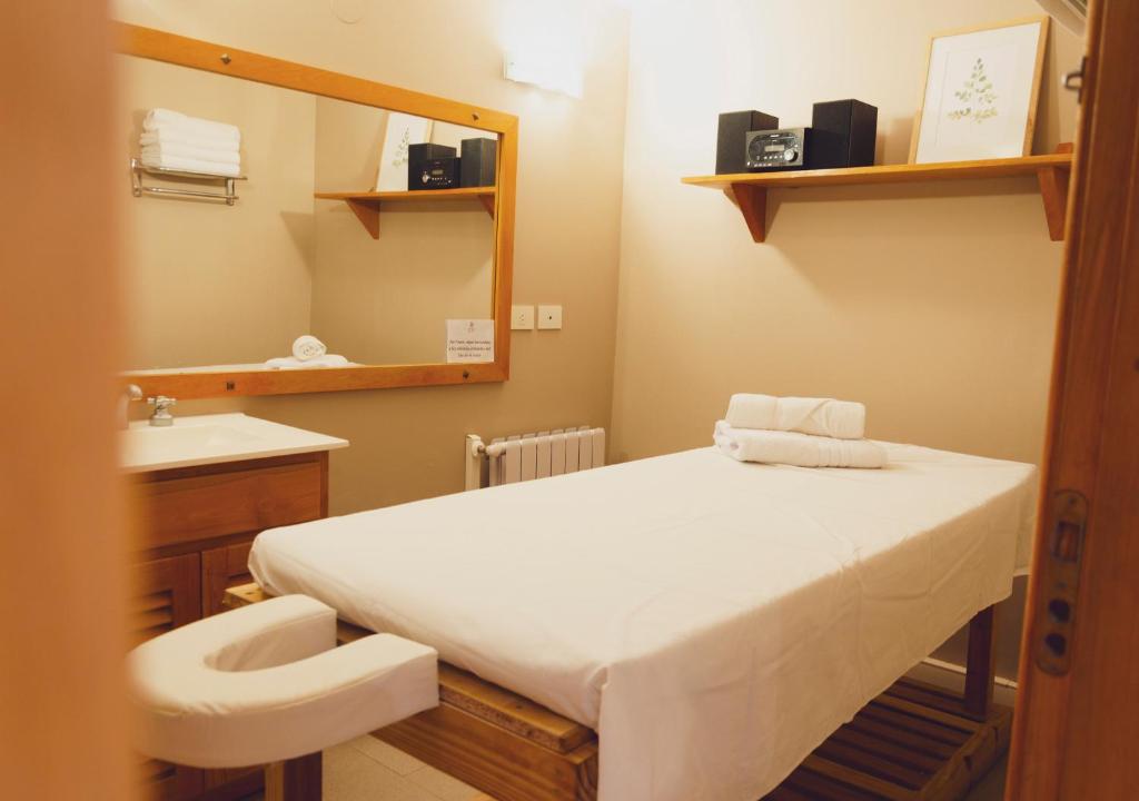 Postel nebo postele na pokoji v ubytování ONA Apart Hotel and Spa