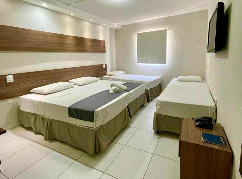 Postel nebo postele na pokoji v ubytování Hotel Pousada Alagoana