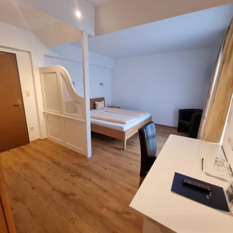 Postel nebo postele na pokoji v ubytování Hotel Central