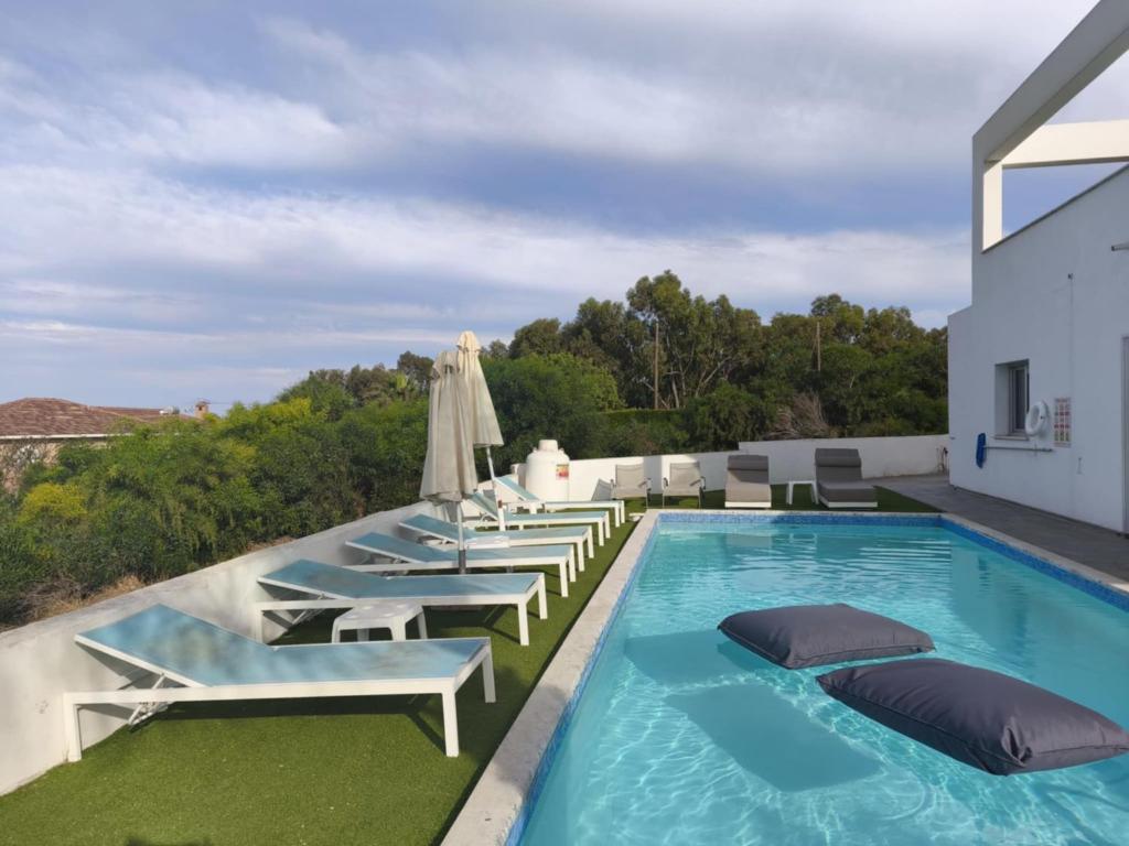 Bazén v ubytování Akefalou Bay Villa nebo v jeho okolí