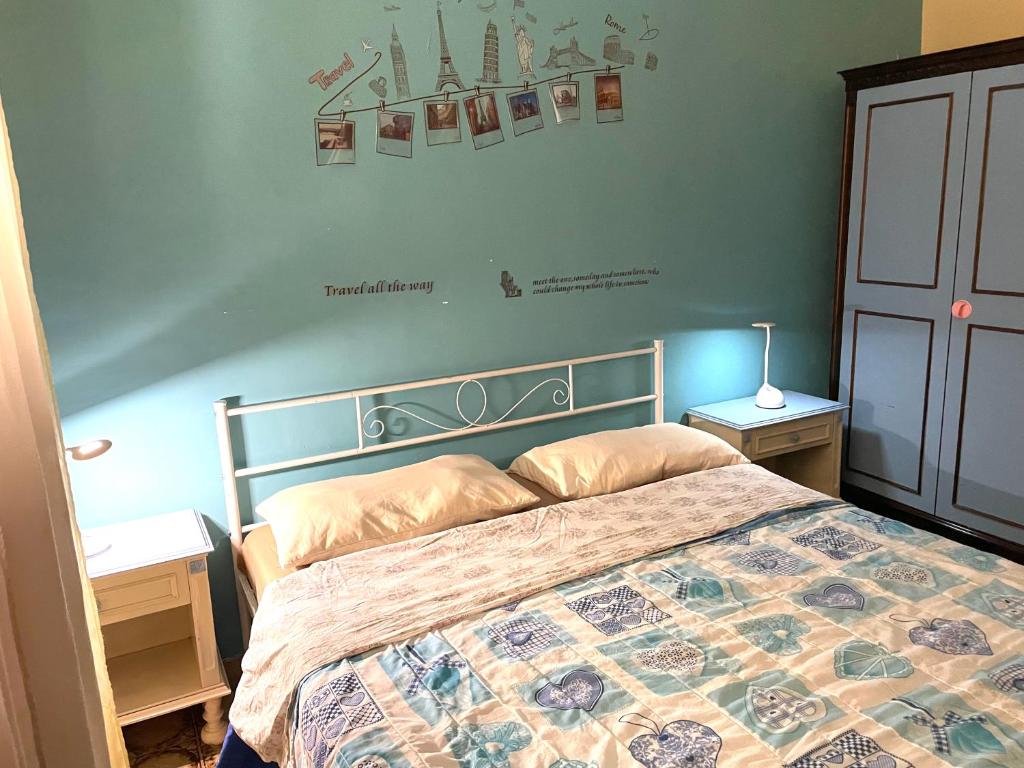 Łóżko lub łóżka w pokoju w obiekcie La Casa Di Lina