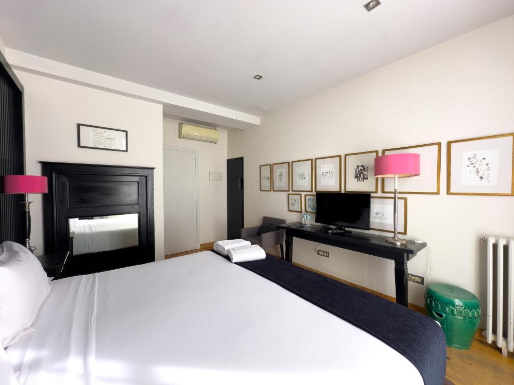 A bed or beds in a room at Hotel Market