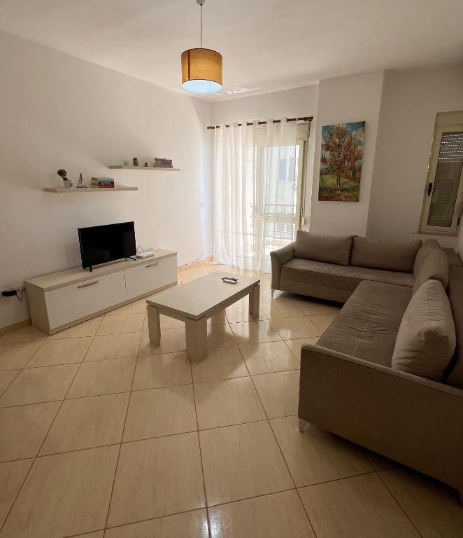TV a/nebo společenská místnost v ubytování SeaView Apartments