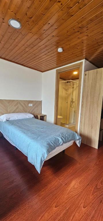 Ένα ή περισσότερα κρεβάτια σε δωμάτιο στο Apartamento San Simón