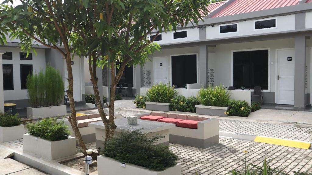 Zahrada ubytování Cataleya Homestay Lagoi Bintan