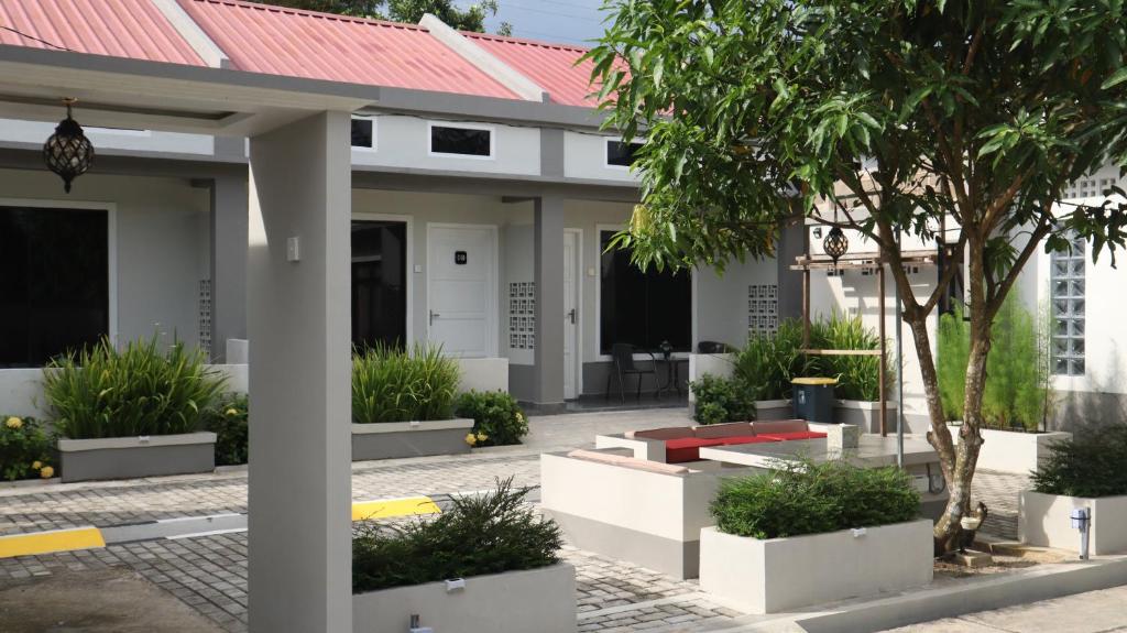 Zahrada ubytování Cataleya Homestay Lagoi Bintan
