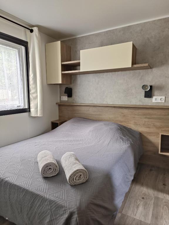 Posteľ alebo postele v izbe v ubytovaní Mobil home - 4 Etoiles - 3 chambres