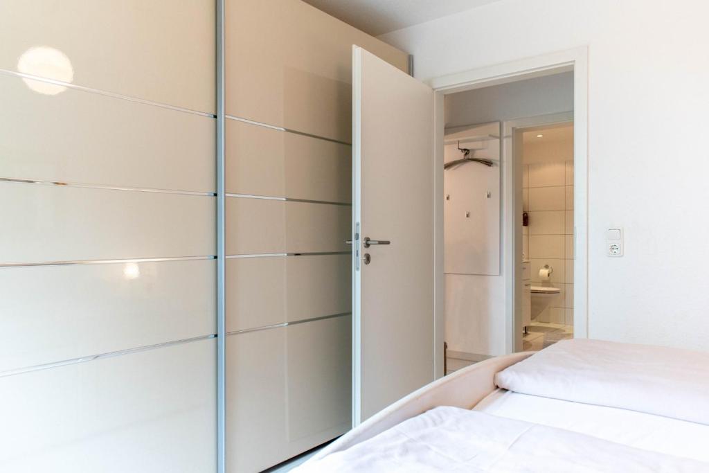 Postel nebo postele na pokoji v ubytování Ferienwohnung Mare Time 1