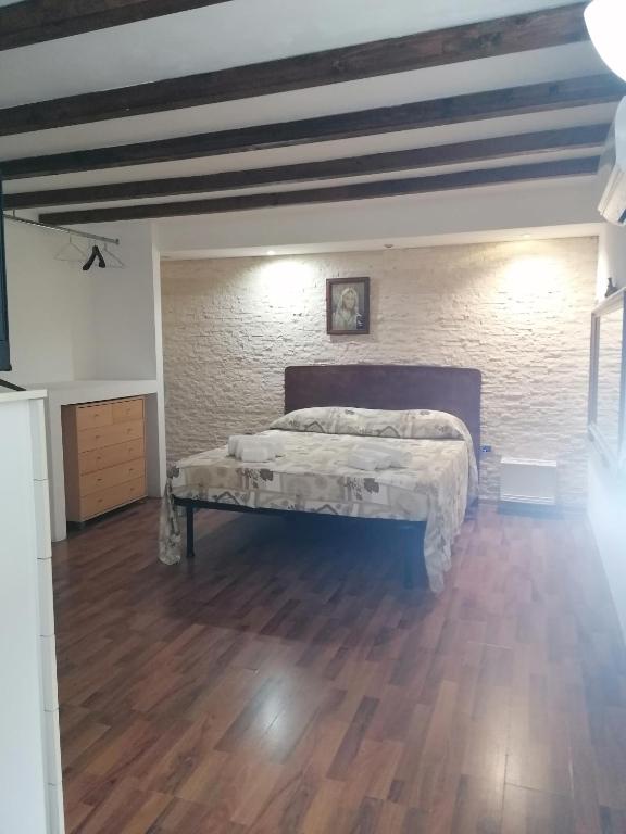 Postel nebo postele na pokoji v ubytování Mille e una notte house