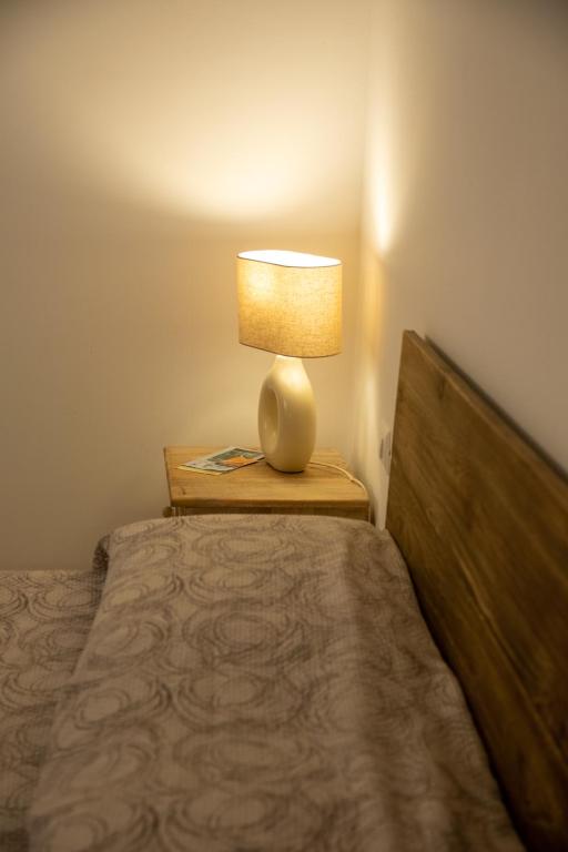 Postel nebo postele na pokoji v ubytování Terrazzo sullo Ionio