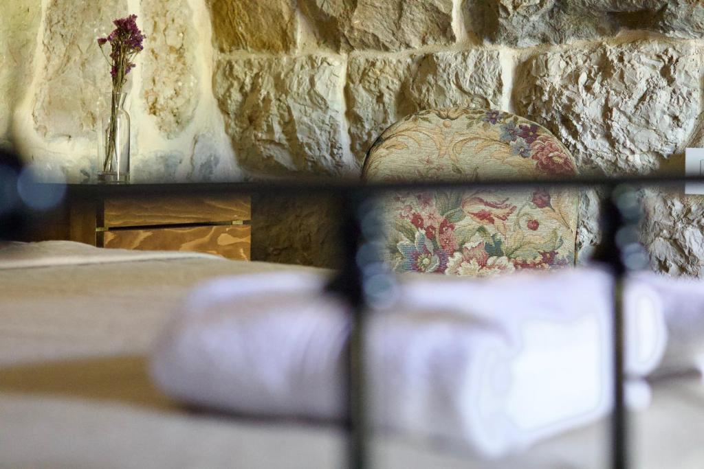 Postel nebo postele na pokoji v ubytování Stone Cellars