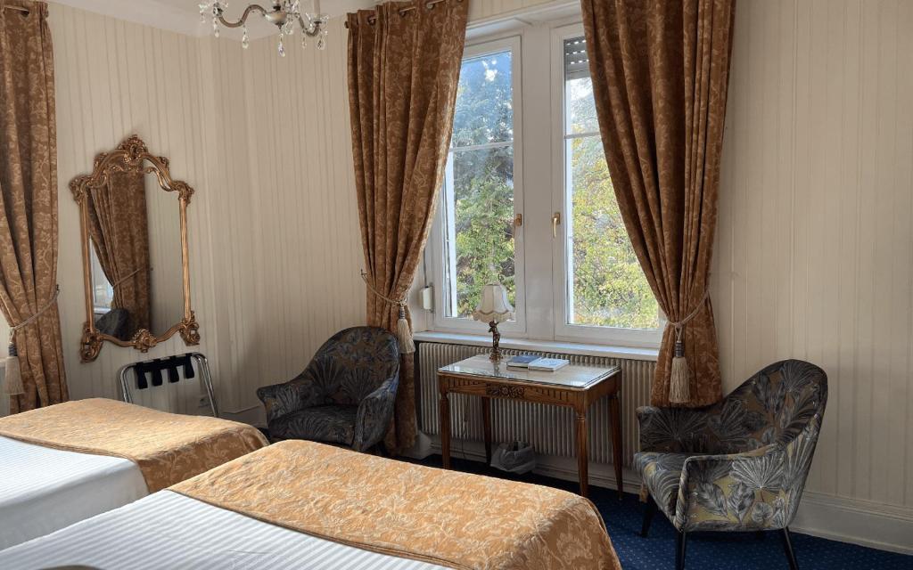 Postel nebo postele na pokoji v ubytování Hotel Restaurant Du Parc