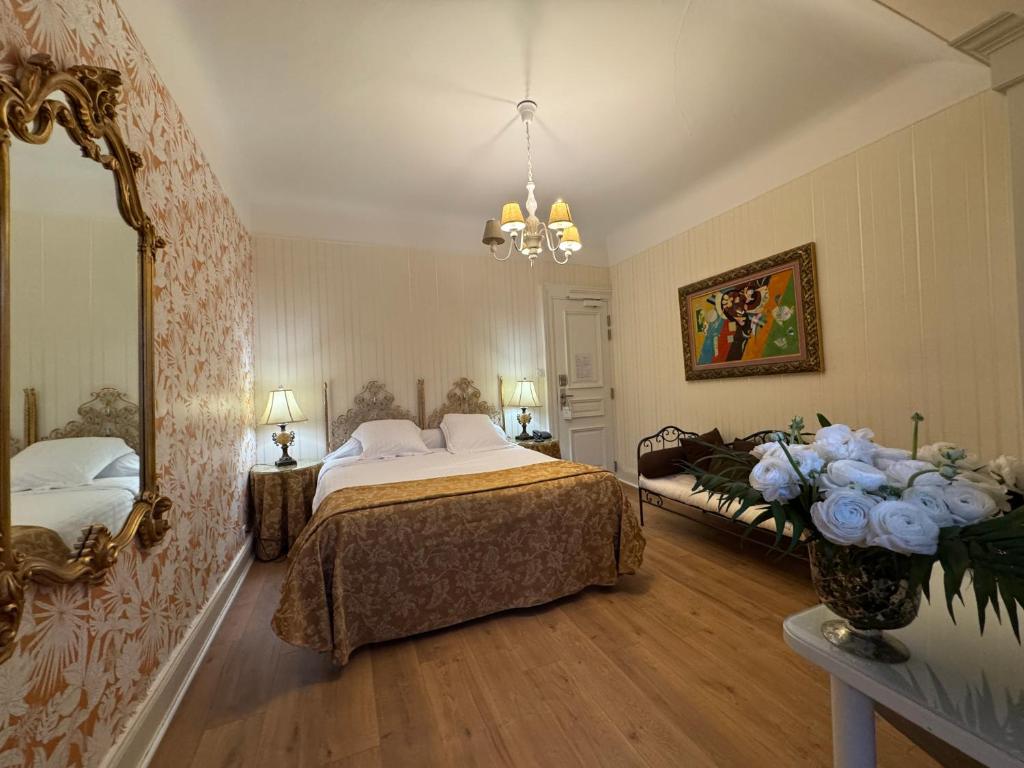 Postel nebo postele na pokoji v ubytování Hotel Restaurant Du Parc