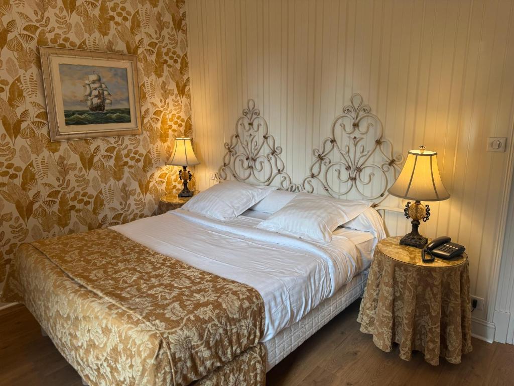 Postel nebo postele na pokoji v ubytování Hotel Restaurant Du Parc