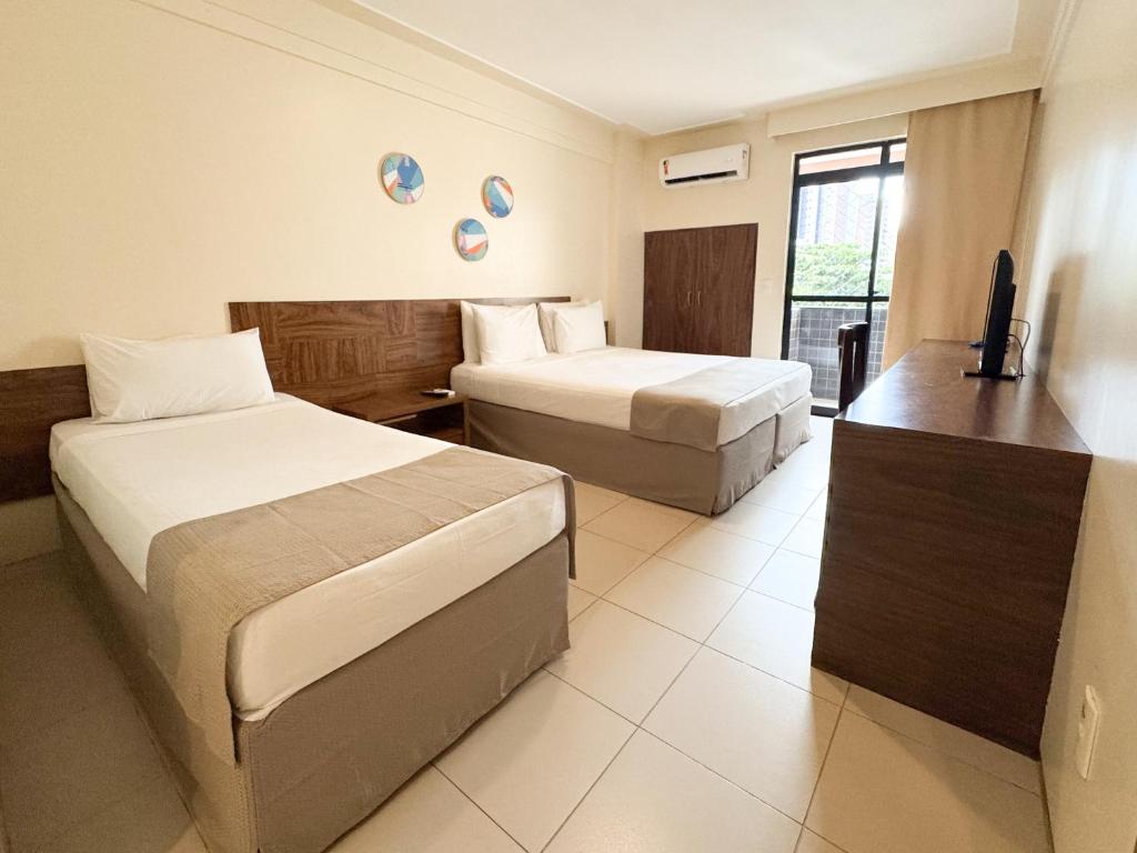 Postel nebo postele na pokoji v ubytování D8 Hotel Express