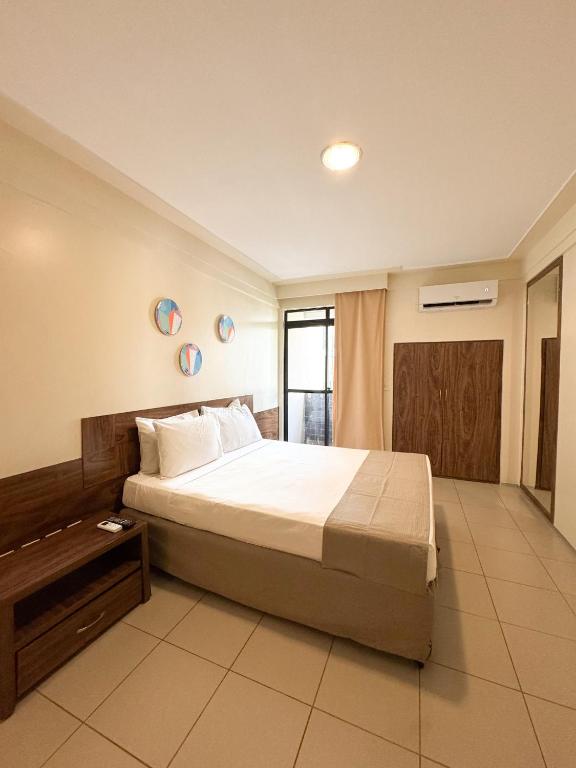 Postel nebo postele na pokoji v ubytování D8 Hotel Express