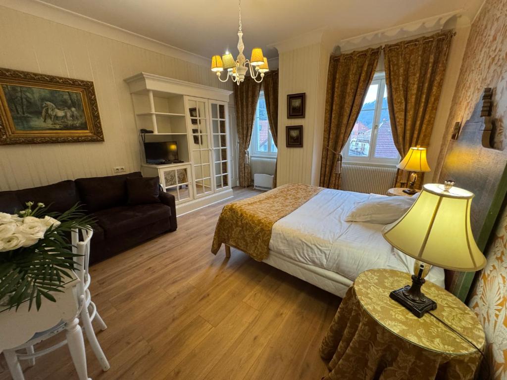 Postel nebo postele na pokoji v ubytování Hotel Restaurant Du Parc