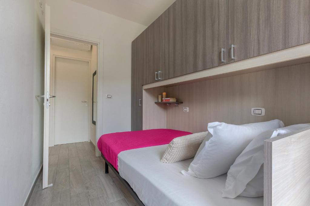 Postel nebo postele na pokoji v ubytování Lido degli Estensi Seaview Apartment