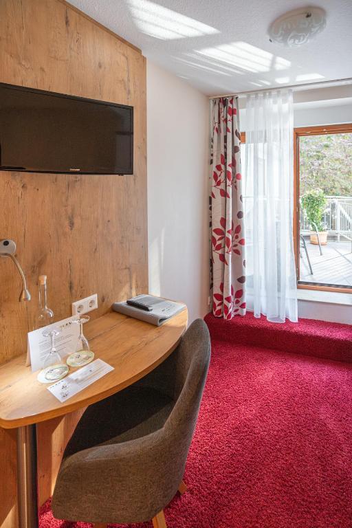 Posezení v ubytování DEVA Hotel Renchtalblick